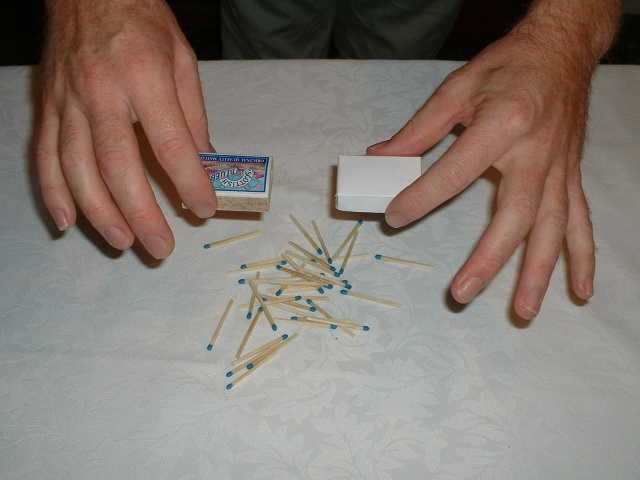 Squeeze gently and the matches will fall out.