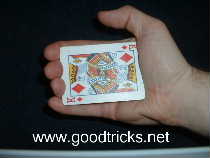 Hold cards in the palm of the hand in palm position