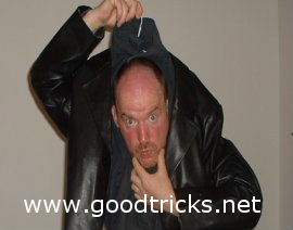 Carefully pull up coat hanger to give impression that head has lowered