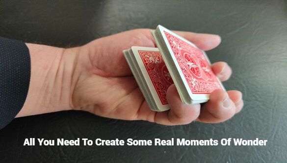 Deck Of Cards Being Held In A Pinky Break